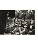 Thumbnail image of Ben Thornberry's photograph of police person wearing rubber glove at an ACT UP demonstration in 1988