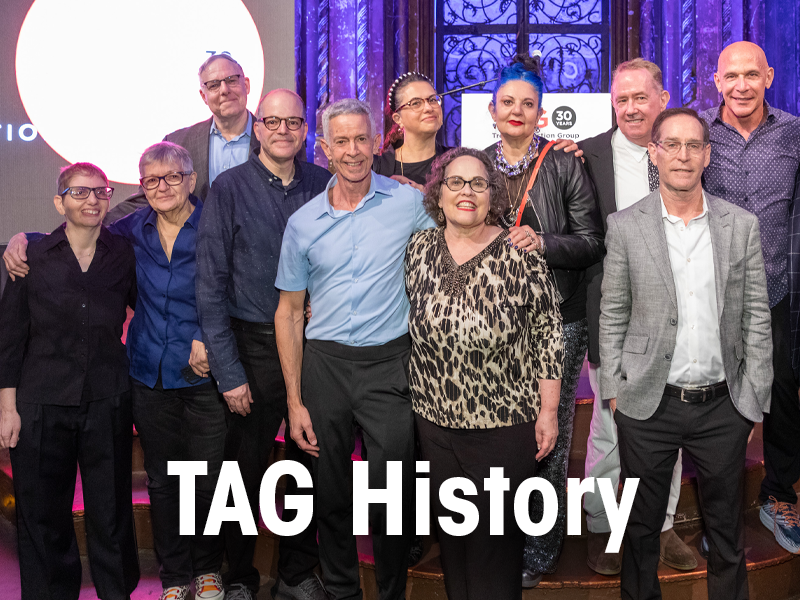Photo with eleven men and women, with the label "TAG History"